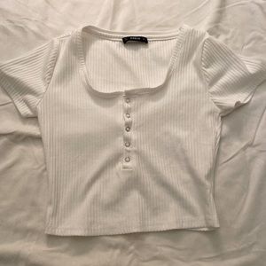 white scoop neck shirt (silver buttons)